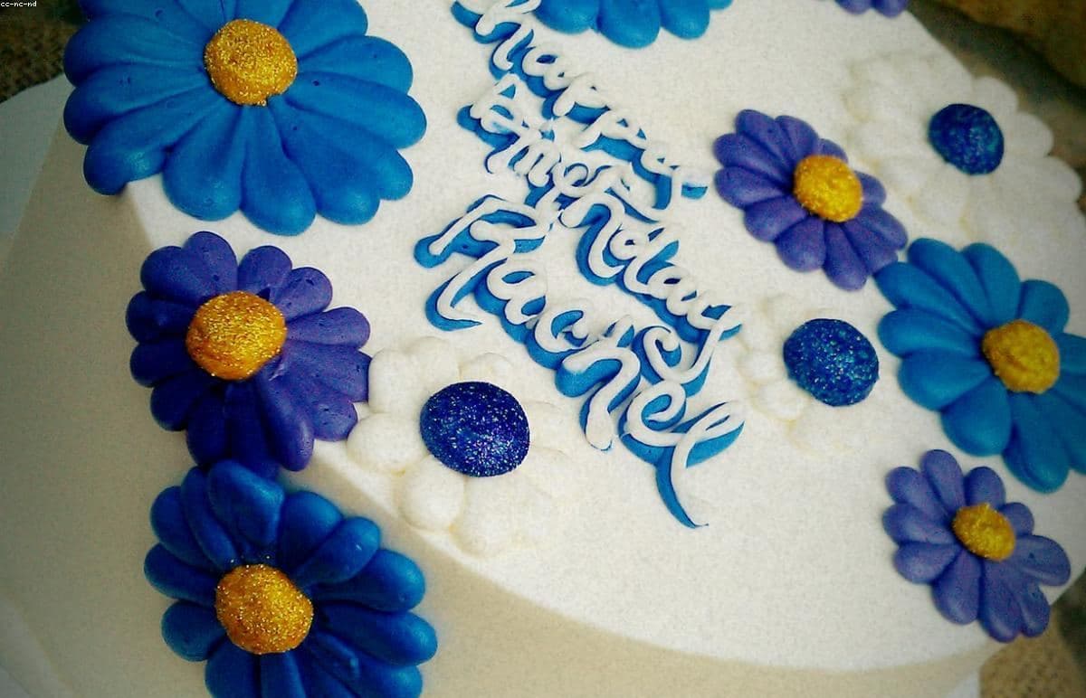 A decorated cake on a bakery counter